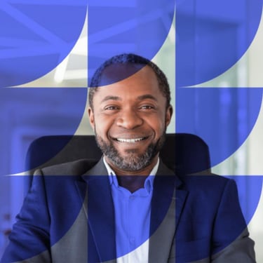 Smiling man in a dark suit jacket against a purple background with geometric overlay.